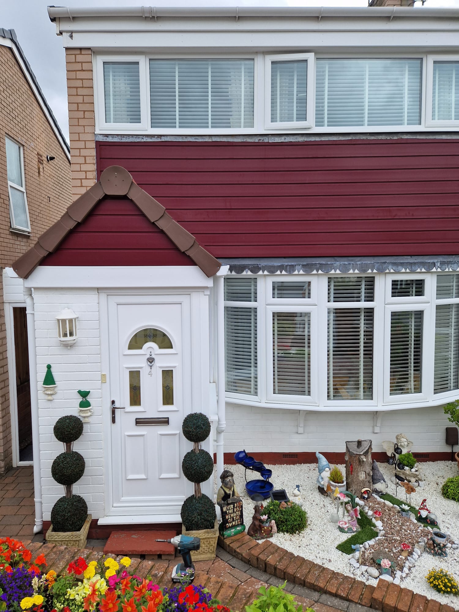 Coloured exterior cladding fitted to a house