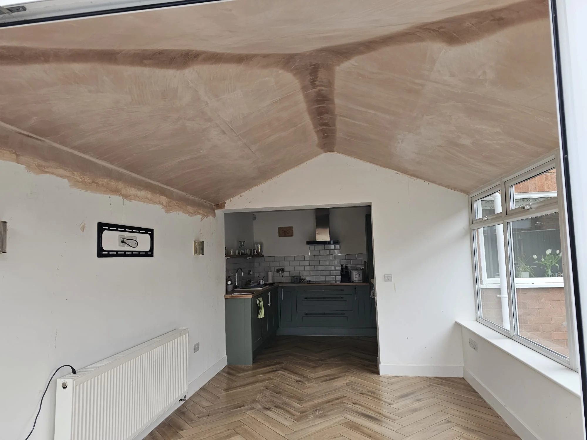 Finished interior beneath a replacement warm roof